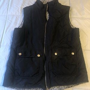 black fuzzy vest